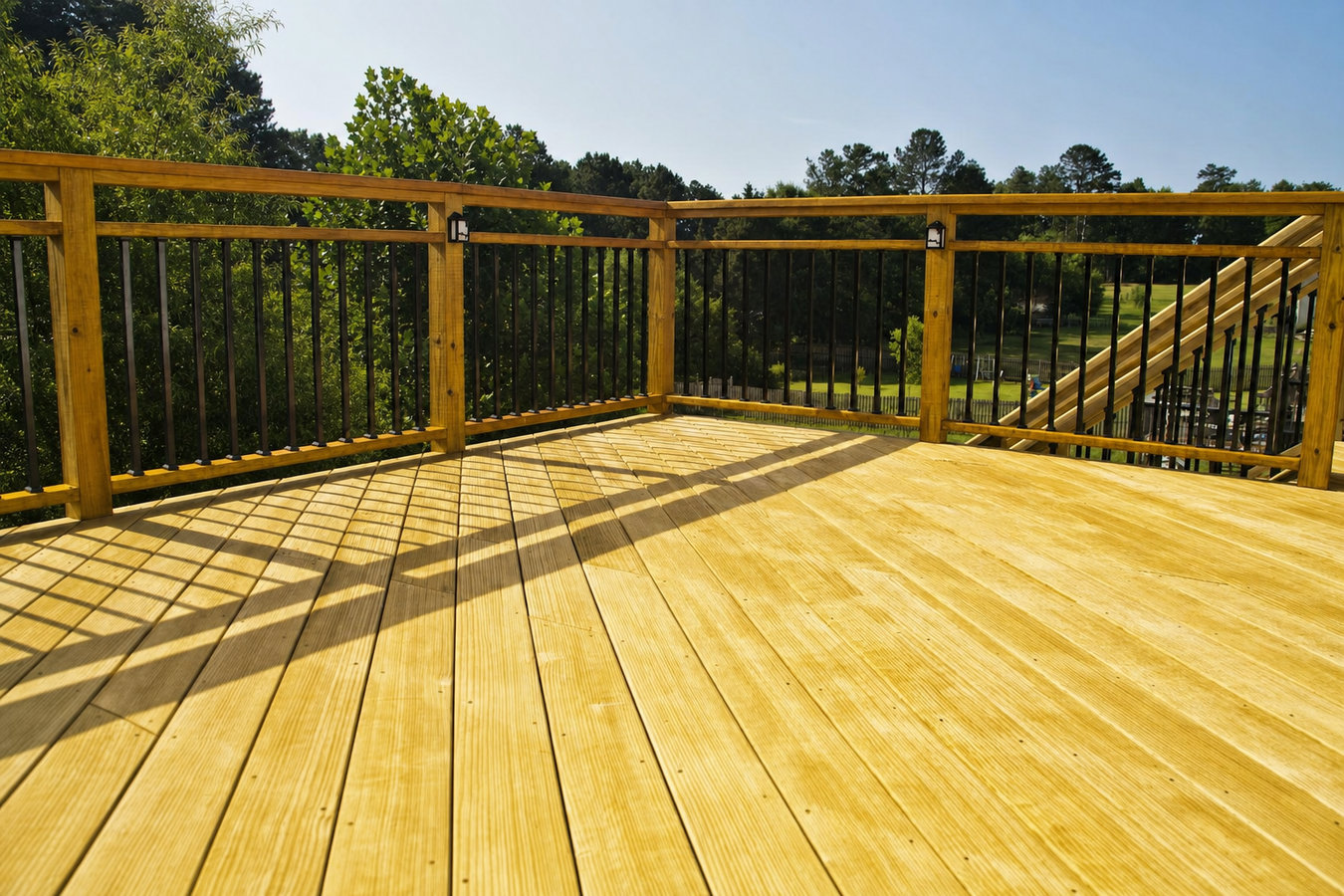 Pressure-treated wood deck construction